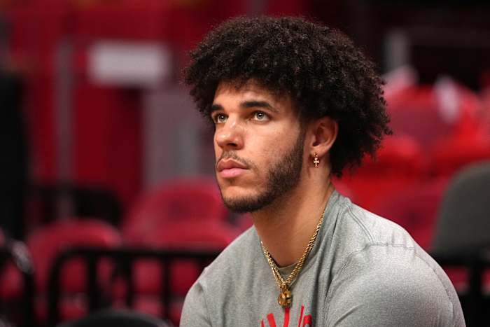 Dec 11, 2021; Miami, Florida, USA; Chicago Bulls guard Lonzo Ball sits court-side prior to the game against the Miami Heat